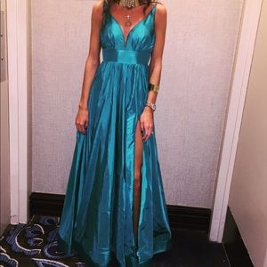 Emerald green ball gown paid a lot of money